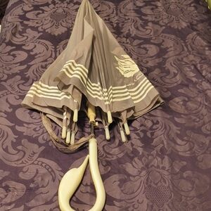 Elegant Beige Umbrella with Striped Design